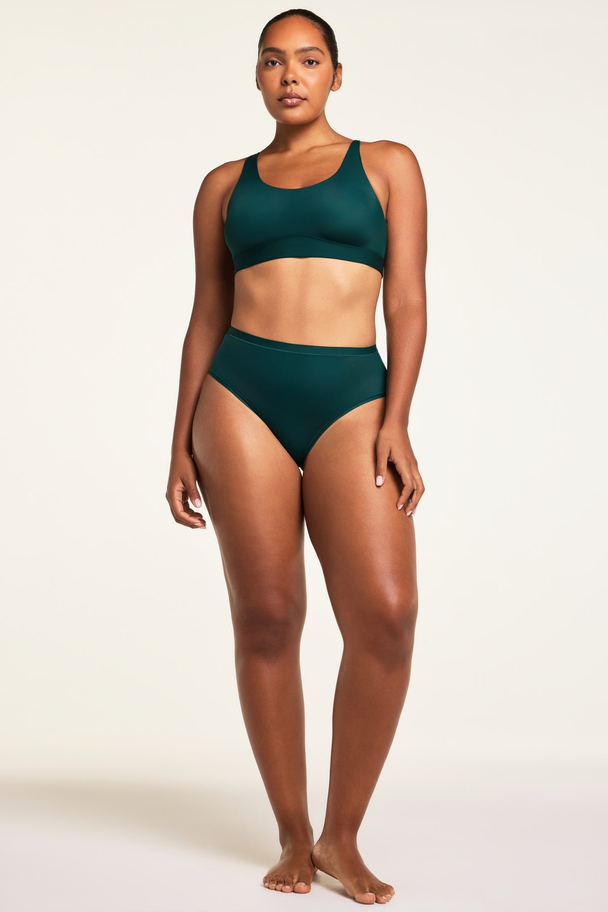 Three-quarter back view of the Bliss French Cut Brief in Pine paired with the Bliss Scoop Bralette in Pine.