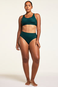 Three-quarter back view of the Bliss French Cut Brief in Pine paired with the Bliss Scoop Bralette in Pine.