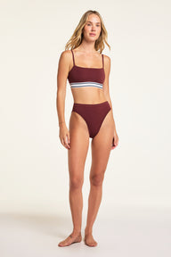 Three-quarter back view of the Cloud Cotton French Cut Brief in Cabernet paired with the Cloud Cotton Bandeau Bralette in Cabernet.