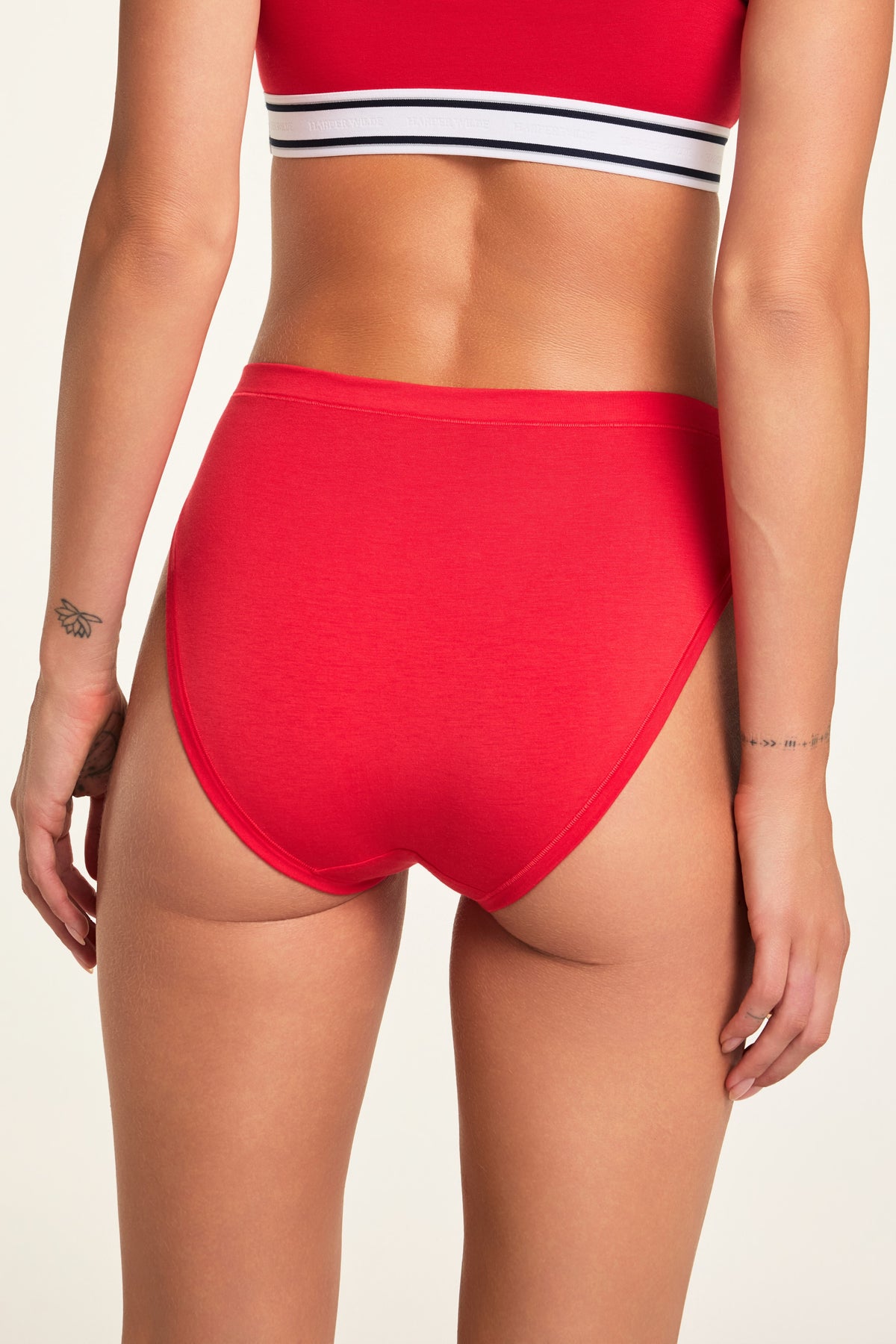 Three-quarter back view of the Cloud Cotton French Cut Brief in Cherry paired with the Cloud Cotton Bandeau Bralette in Cherry.