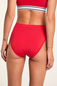 Three-quarter back view of the Cloud Cotton French Cut Brief in Cherry paired with the Cloud Cotton Bandeau Bralette in Cherry.