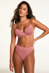 Three-quarter back view of the Cloud Cotton Highwaist Thong in Winter Rose paired with the Cloud Cotton T-Shirt Bra in Winter Rose.