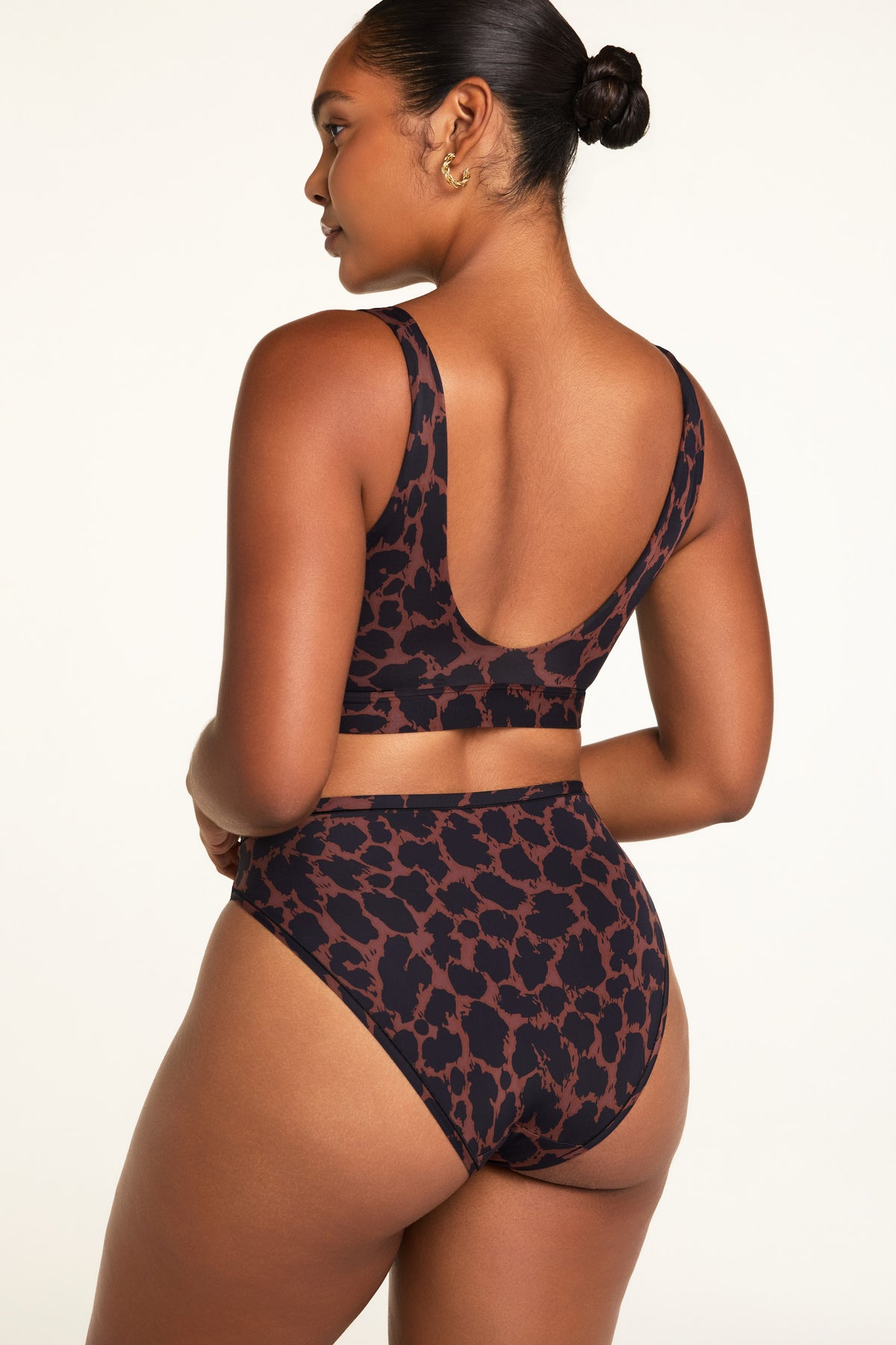 Three-quarter back view of the Bliss Bralette in Leopard paired with the Bliss French Cut Brief in Leopard.