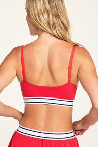 Three-quarter back view of the Cloud Cotton Bandeau Bralette in Cherry paired with the Cloud Cotton Short in Cherry.