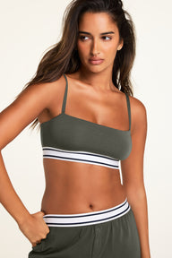 Three-quarter back view of the Cloud Cotton Bandeau Bralette in Olive paired with the Cloud Cotton Pant in Olive.