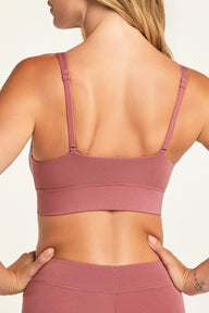 Three-quarter back view of the Cloud Cotton Plunge Bralette in Winter Rose paired with the Cloud Cotton Highwaist Boyshort in Winter Rose.