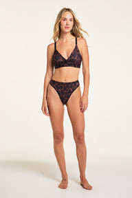 Back on-model view of the Bliss Thong in Leopard paired with the Bliss Triangle Bralette in Leopard.