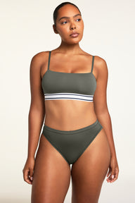 Back on-model view of the Cloud Cotton French Cut Brief in Olive paired with the Cloud Cotton Bandeau Bralette in Olive.