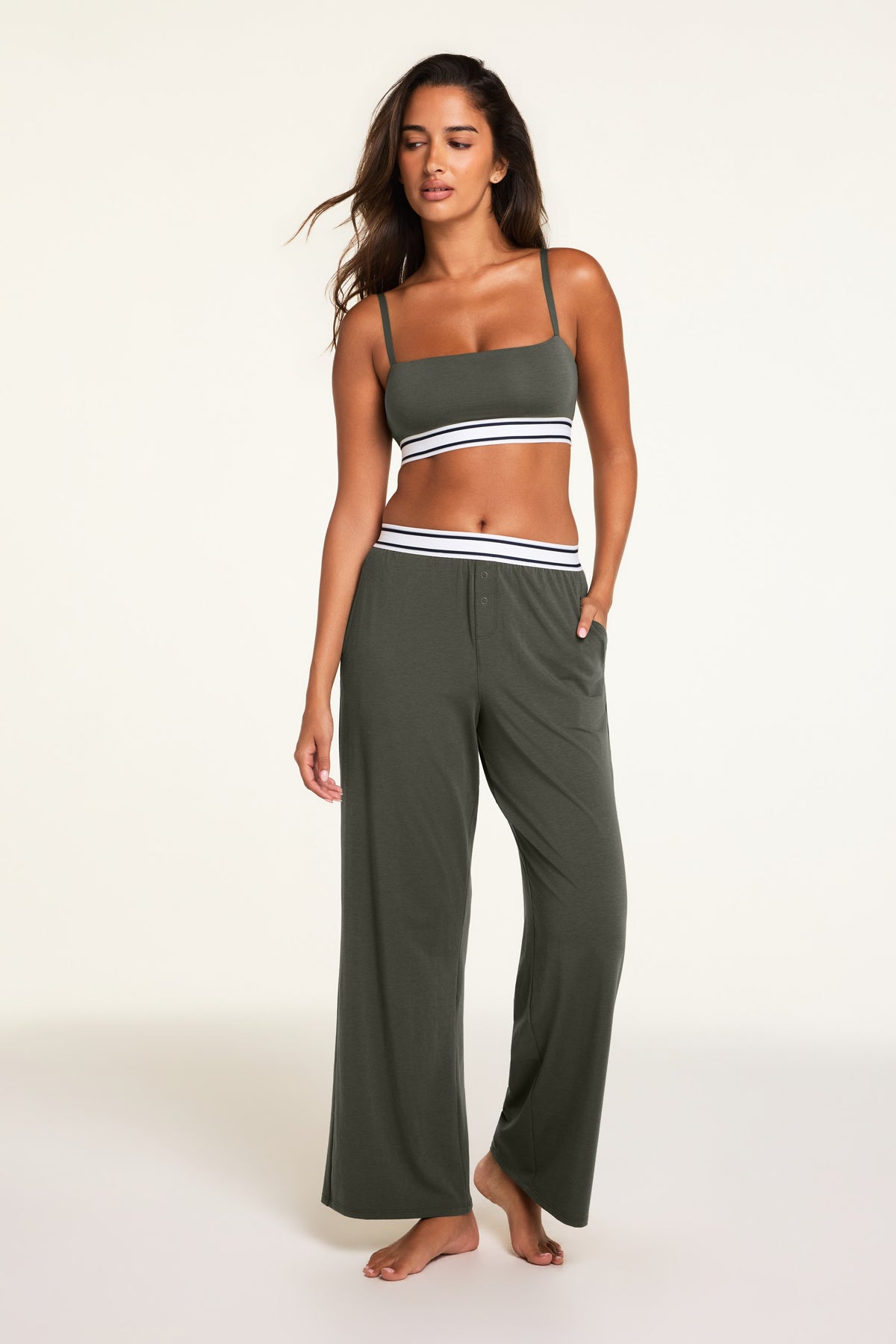 Back on-model view of the Cloud Cotton Pant in Olive paired with the Cloud Cotton Bandeau Bralette in Olive.