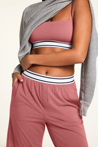 Back on-model view of the Cloud Cotton Pant in Winter Rose paired with the Cloud Cotton Bandeau Bralette in Winter Rose.