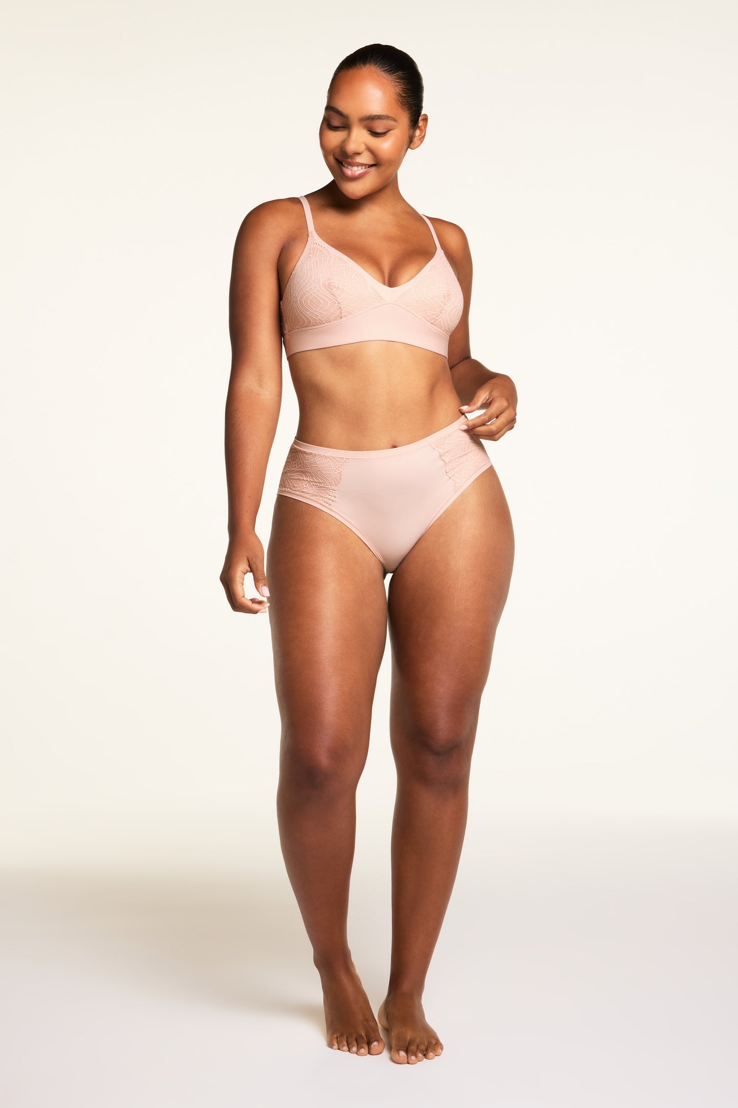 Back close-up of the Bliss Lace Highwaist Brief in Ember Rose, highlighting the decorative lace panel and smooth waistband