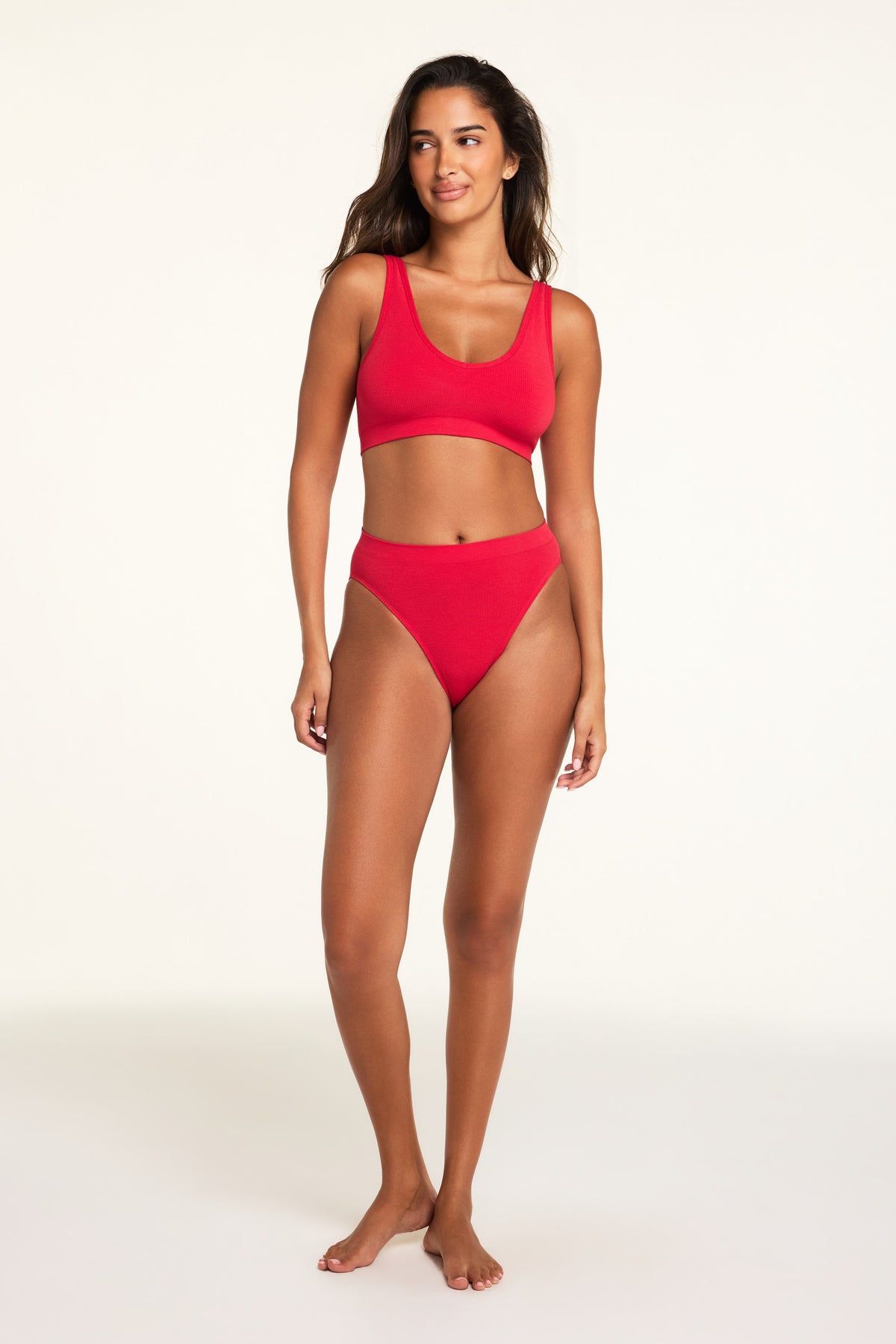 Additional on-model view of the Knit Seamless French Cut Brief in Cherry paired with the Knit Seamless Bralette in Cherry.