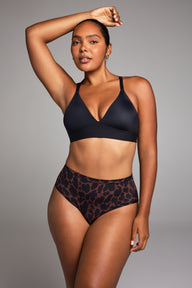 Editorial on-model shot of the Bliss Triangle Bralette in Black styled with the Bliss Highwaist Brief in Leopard.