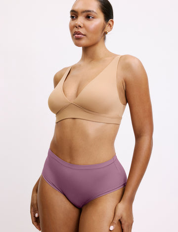 In a studio setting, Amber wears the Bliss High Waist underwear in Mirage paired with a matching bralette, shown in a front view. The underwear features a high-rise fit, smooth fabric, and full coverage.  sizing: Amber wears size Large