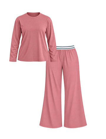 A two-piece women's loungewear set in Winter Rose, featuring a long-sleeve crewneck Cloud Cotton T-Shirt and matching Cloud Cotton pants with a white and navy striped waistband.