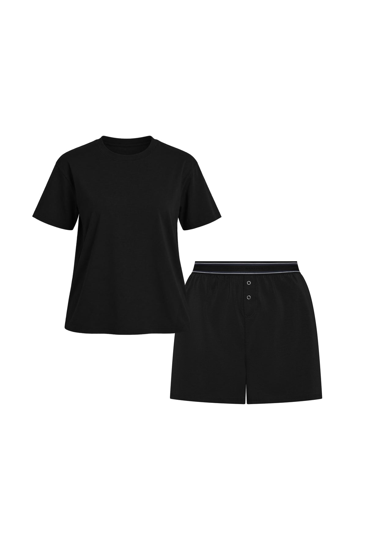 Flat lay of the Cloud Cotton Sleep Set in Black, featuring a short-sleeve tee with chest pocket and matching boxer-style sleep shorts. The shorts have a button fly and tonal waistband with a thin black stripe detail. Displayed against a white background for a clean, minimal presentation.