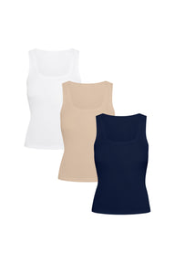 Product shot of Harper Wilde The Tank Trio — three Bliss scoop-neck tanks in White, Beige, and Navy, ultra-soft everyday essentials for layering under sweaters, jackets, and fall knits