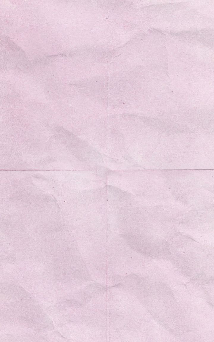Blush pink crumpled paper background