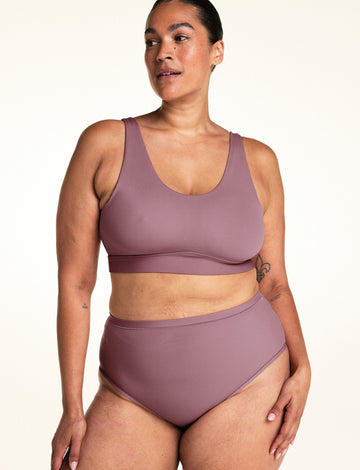 Front angle view of the Bliss Scoop Adjustable Bralette in Mirage, highlighting the thick adjustable straps and smooth supportive fabric