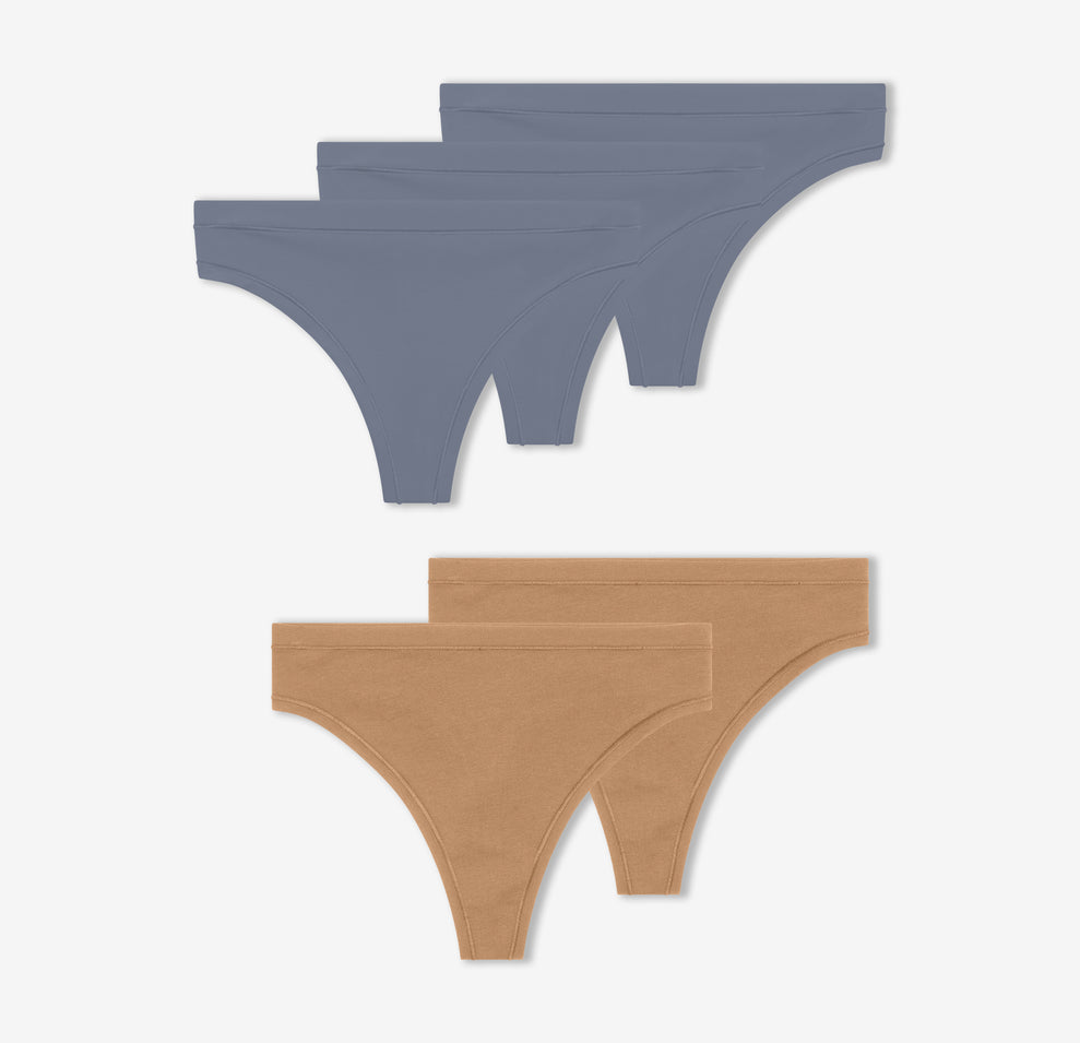 A trio of Harper Wilde's Bliss Thongs in Steel and a duo of Cloud Cotton Highwaist Thongs in Tan against a white background.