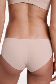 Back view of the No-Show Hiphugger in Beige, featuring full coverage and a smooth, no-show finish with minimal seams.
