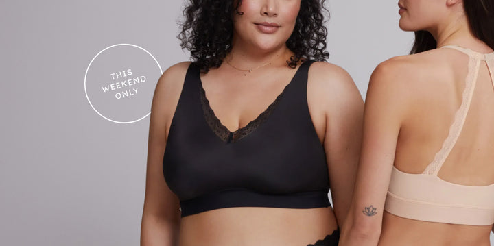 Two women wearing Bliss Lace Bralettes — one in black with lace trim and the other in beige with a racerback lace design — against a soft blue background promoting a 25% off sale.