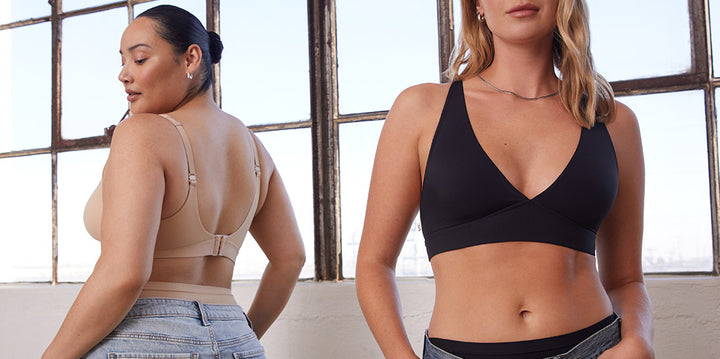 Bianca and Megan wearing the Bliss Plunge Adjustable Bralette, shown in contrasting views. Bianca is seen from the back in the Beige bralette, with adjustable straps and a hook-and-eye closure for added support. Megan is shown from the front in the Black bralette, highlighting the deep V-neck and smooth finish, paired with casual denim.