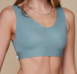 Model wearing the Bliss Bralette in the color Mist.