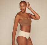 Woman wearing the Bliss Scoop Bralette in the color Brown