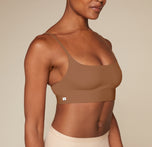 Woman wearing the Bliss Scoop Bralette in the color Brown