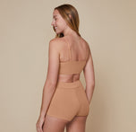 Back view of model wearing the Cloud Cotton Triangle Bralette showing the adjustable bralette straps.