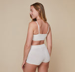 Back view of model wearing the Cloud Cotton Triangle Bralette showing the adjustable bralette straps.