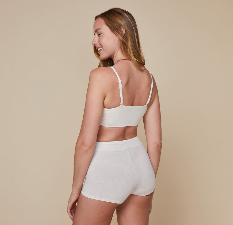 Back view of model wearing the Cloud Cotton Triangle Bralette showing the adjustable bralette straps.