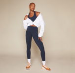 Flex high rise compressive legging with pockets in Ink sizing: Danah wears size Small