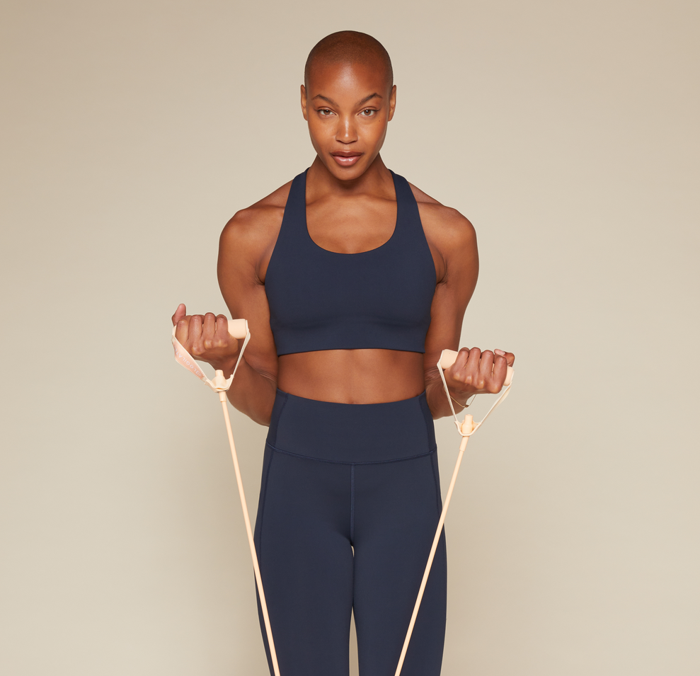 Flex ultra-soft convertible cross-back sports bra in Ink sizing: Danah wears size Small