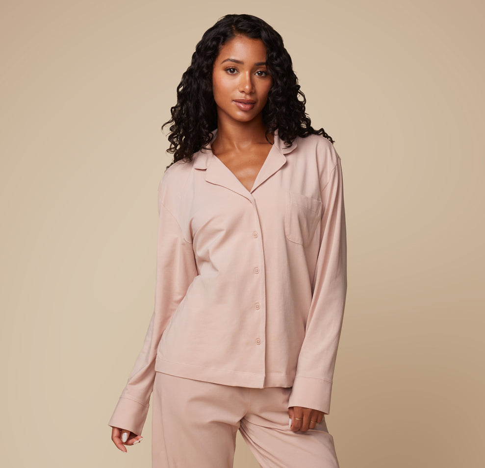Model Ally in the Pima PJ Longsleeve and Pima PJ Pants in Bellini. The relaxed loungewear set emphasizes comfort and softness.