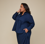 Woman wearing the Classic Poplin Pajama Shirt in color Midnight