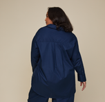 Woman wearing the Classic Poplin Pajama Shirt in color Midnight