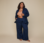 Woman wearing the Classic Poplin Pajama Shirt in color Midnight