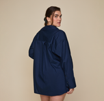 Woman wearing the Classic Poplin Pajama Shirt in color Midnight
