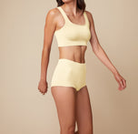 Front view of model Anna in the Lounge Rib Boyshort in Sunnyside, emphasizing the soft texture and comfortable fit.