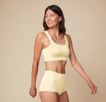 Front view of model Anna wearing the Lounge Scoop Bralette and Lounge Rib Boyshort in Sunnyside, emphasizing the comfy fit and soft fabric texture. sizing: Anna wears size Small