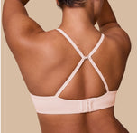 India showcases the Base T-Shirt Bra in Rose with the straps converted into a racerback style, demonstrating its versatile design.