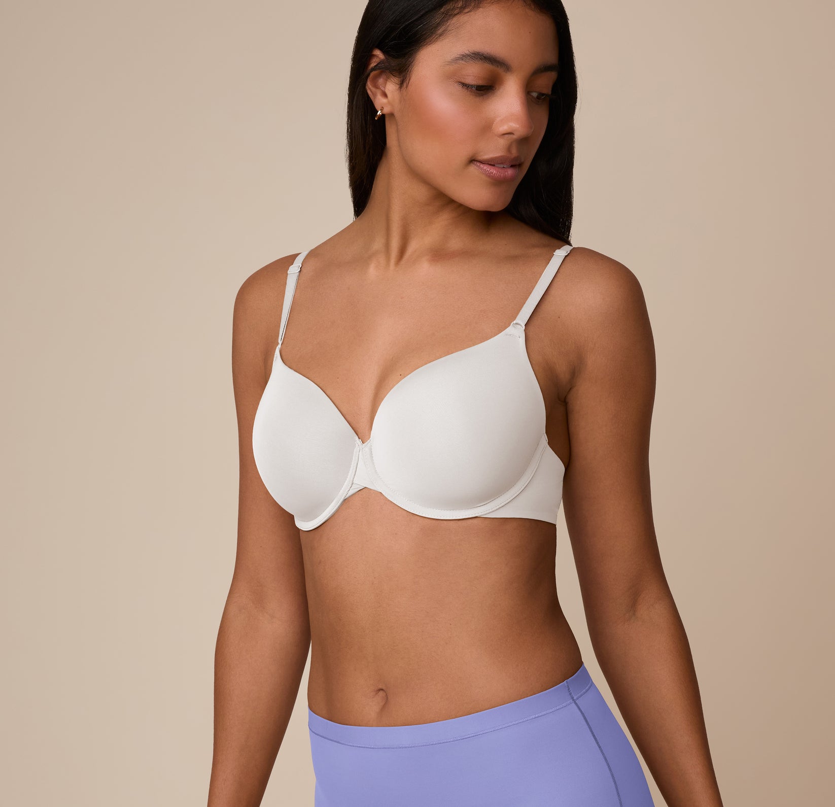 Three-quarter front angle of Nemesis highlighting the lightly lined cups and front adjusting straps of the Base T-Shirt Bra in Frost.
