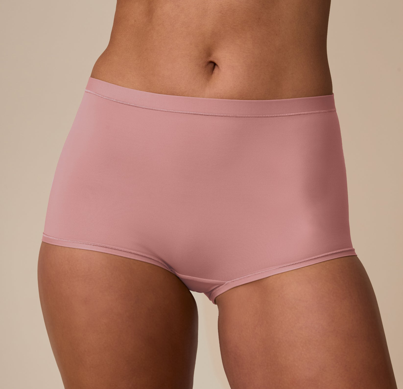 Close-up of Marcela in the Bliss Boyshort in Plum, focusing on the smooth front panel and soft microfiber finish.