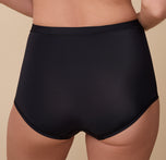 A zoomed-in shot of the waistband and leg openings, emphasizing the soft, stretchy fabric and smooth, clean edges.