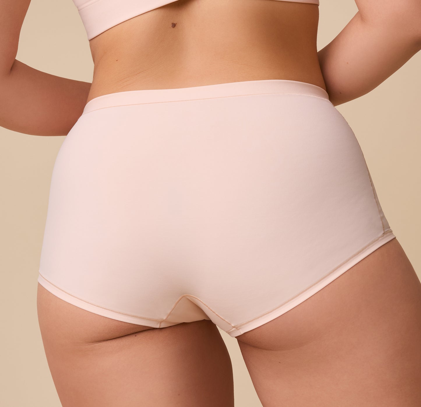 A detailed back view of the boyshort, emphasizing the smooth fit and full rear coverage.