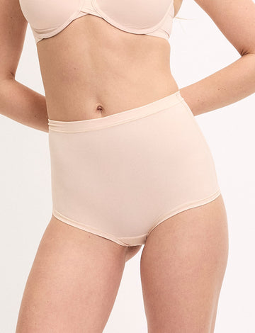 Megan wears the Bliss Boyshort in Rose with a matching bra, featuring a high-rise silhouette and smooth microfiber fabric. sizing: Megan wears size Small