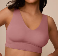 Close-up of the Bliss Bralette in Plum on Marcela, focusing on the bralette’s buttery-soft microfiber fabric and smooth finish under the bust.