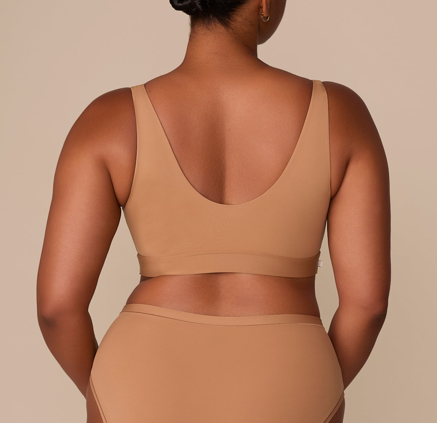 Rear view of the bralette on Zarria, showcasing the deep scoop back and smooth, tag-free finish.